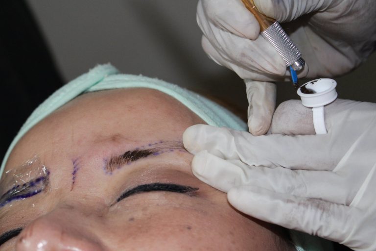 Microblading eyebrow procedure in progress at K's iBrows & Lashes Studio, Aubrey TX
